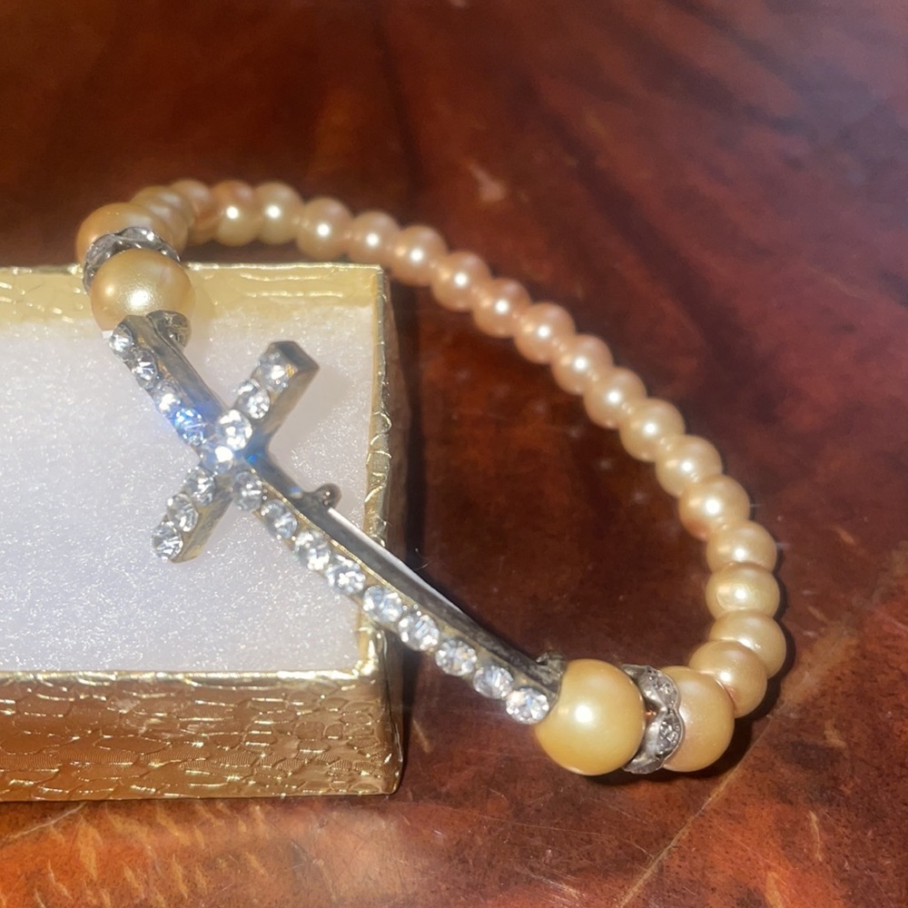 - New crystal cross stretch bracelet peach os